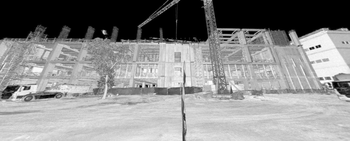 Monochrome point cloud of a multi-storey construction site with a tower crane